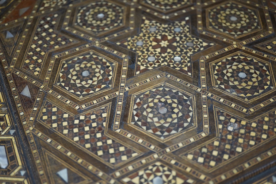 A 20th century Damascus ware heavily inlaid box, 31cm x 31cm. Condition - ball foot missing, inlay good